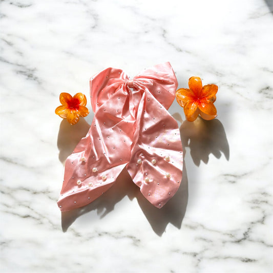 Elegant Pink Bow with Floral Charm