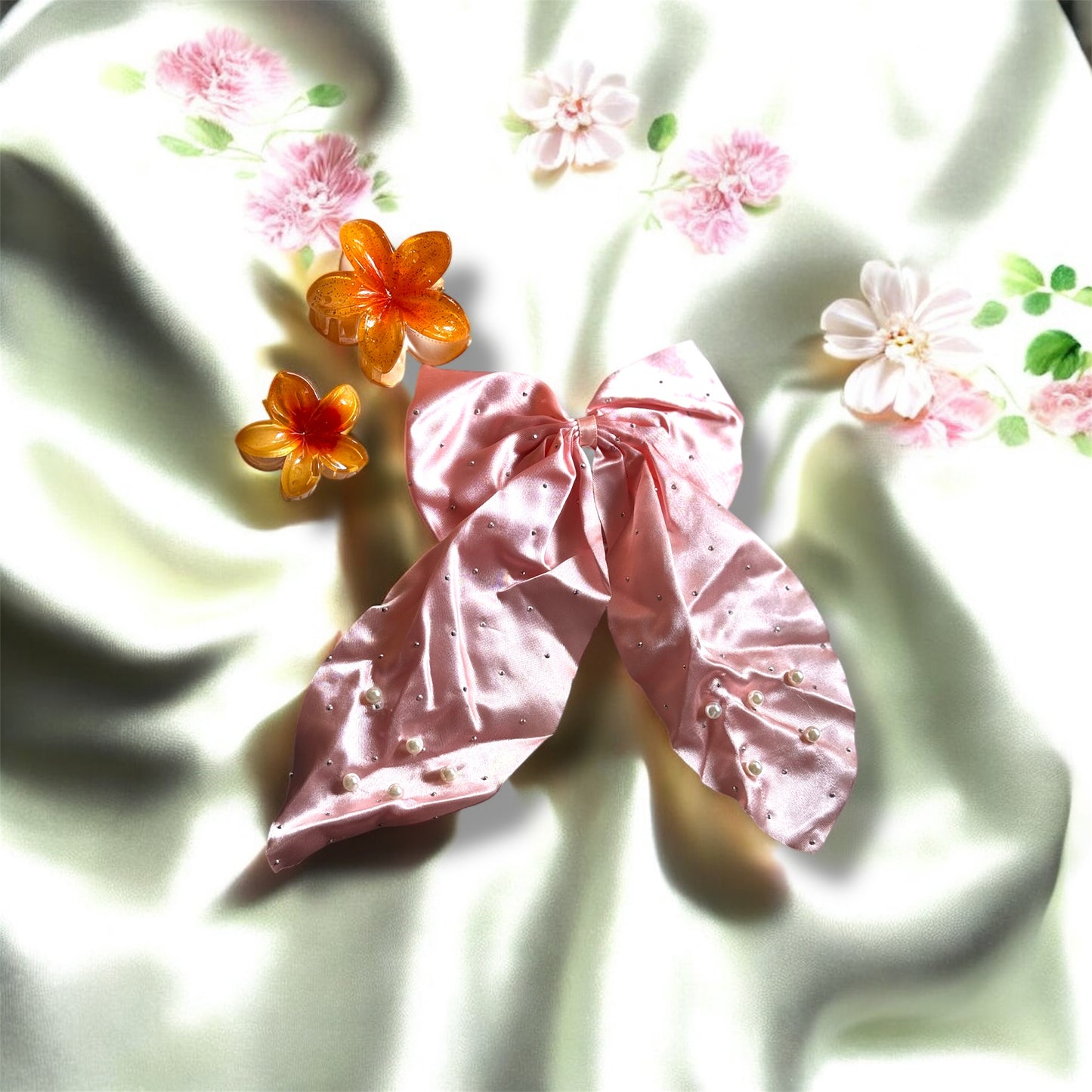 Elegant Pink Bow with Floral Charm